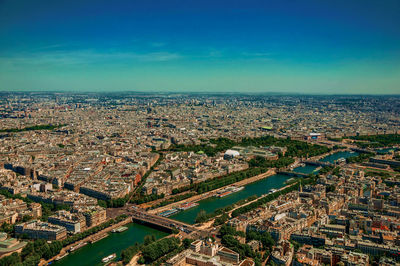 High angle view of townscape against blue sky