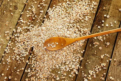 High angle view of wooden spoon on table