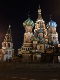 Low angle view of temple building against sky at night