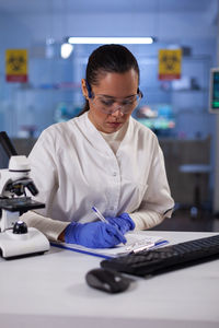 Businesswoman working at desk in office