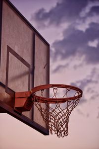 Low angle view of basketball hoop against sky