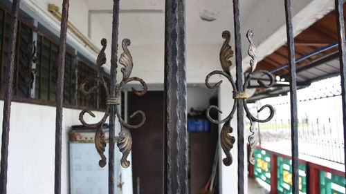 Close-up of old metal gate