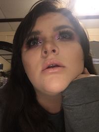 Close-up portrait of woman at home