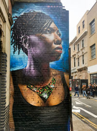 Woman in front of building