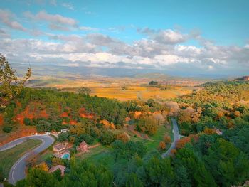 High angle view of trees on landscape against sky