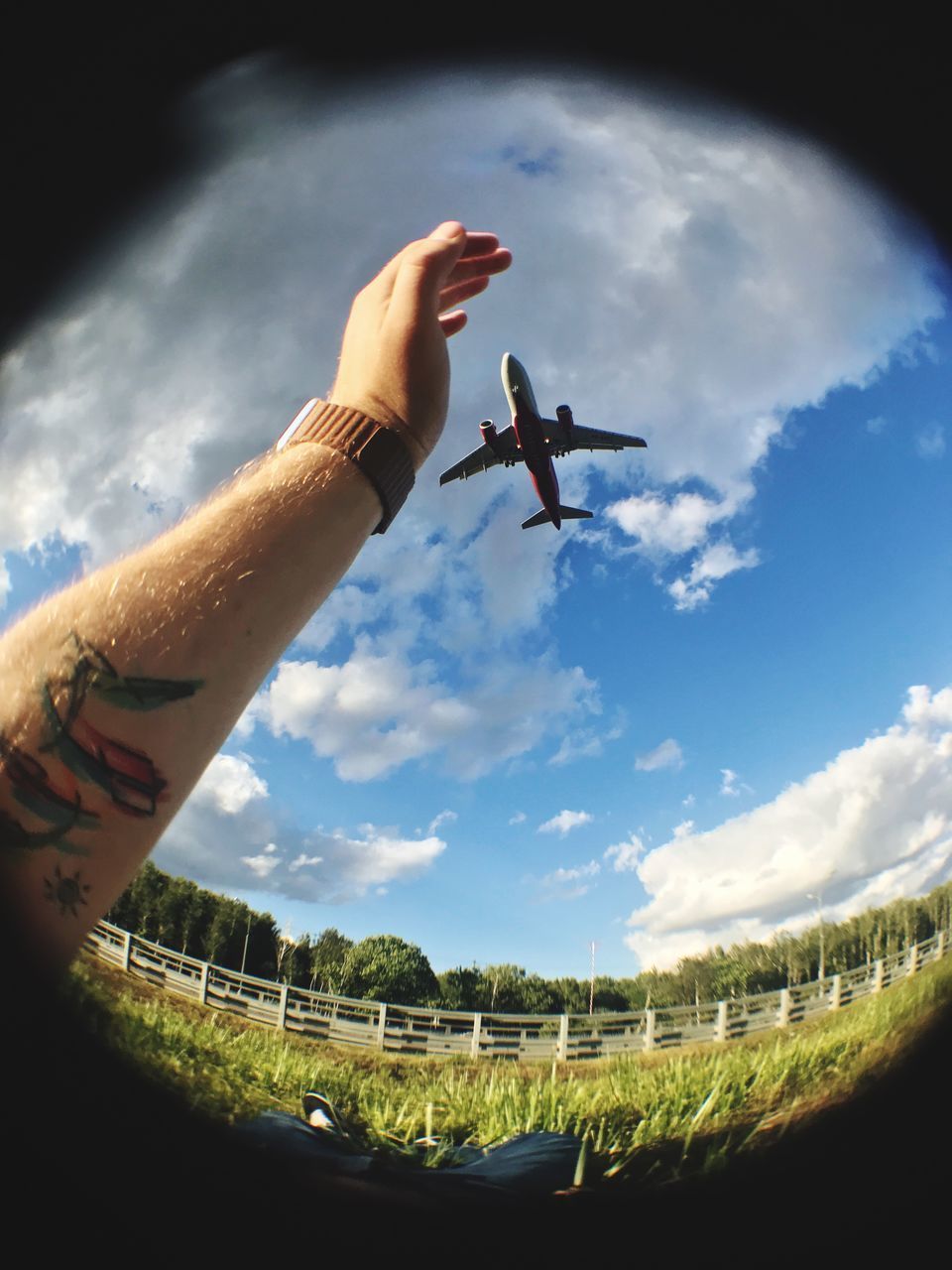 LOW ANGLE VIEW OF PERSON AGAINST SKY