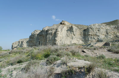 Scenic view of mountain against clear blue sky