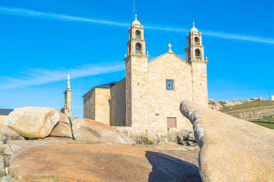 Virxe da barca sanctuary against blue sky on sunny day