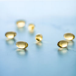 Close-up of pills on white background