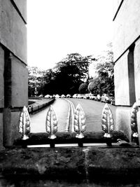 Rear view of people in front of building