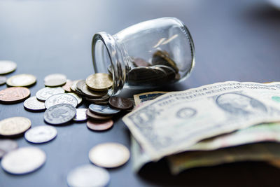 Close-up of coins on table