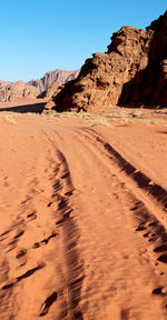 Rock formations in desert against clear sky