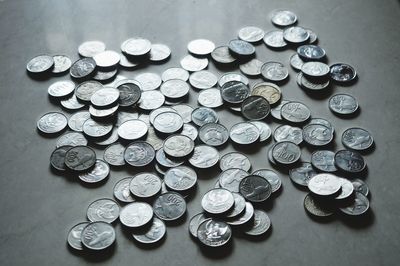 High angle view of coins on table