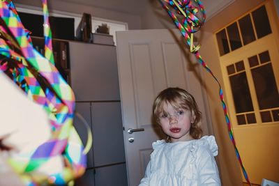 Portrait of cute girl at home