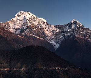 Annapurna south and hiunchuli mountain peaks  in himalayan mountains range in nepal