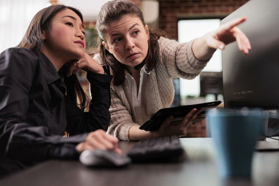 Business colleagues working on table