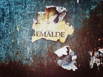 Close-up of text on wall