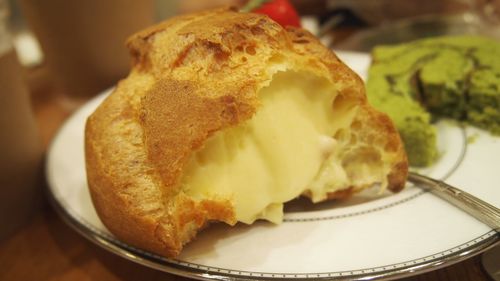 Close-up of bread in plate on table