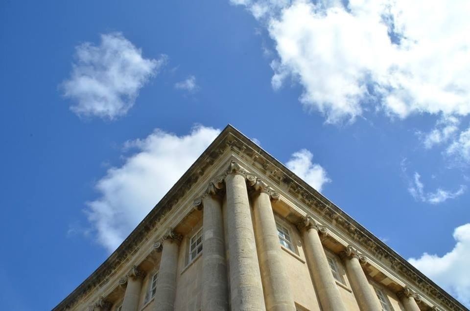 architecture, low angle view, built structure, building exterior, sky, blue, cloud - sky, high section, cloud, day, outdoors, no people, window, religion, history, place of worship, building, spirituality, sunlight, architectural feature