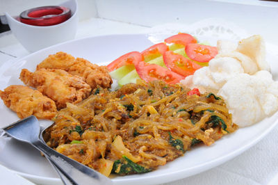Close-up of food in plate on table