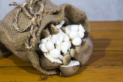 Close-up of mushrooms in sack