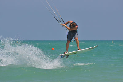 Man surfing in sea