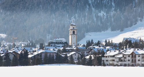 Buildings in city during winter