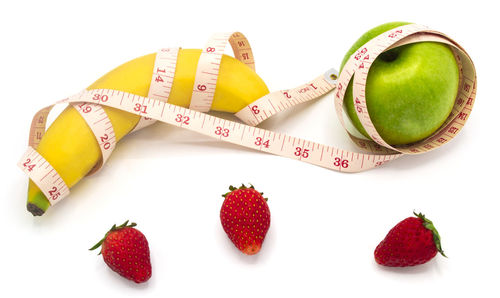 High angle view of fruits against white background