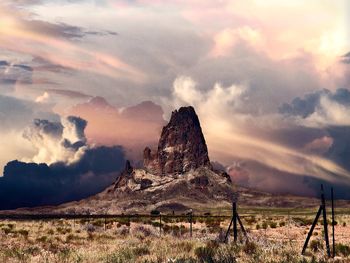 Scenic view of field against sky during sunset