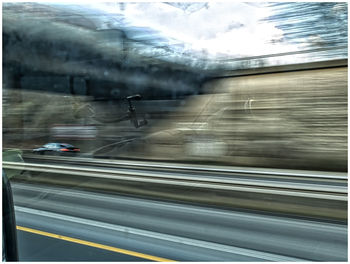 Railroad track seen through train windshield