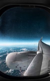 Cropped image of airplane wing