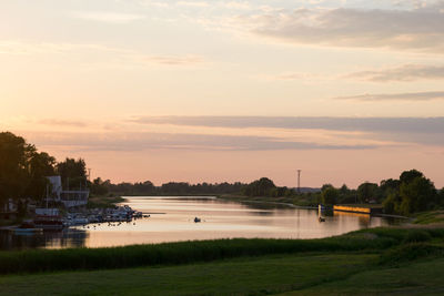 Scenic view of river against sky