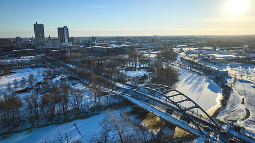 High angle view of city at sunset