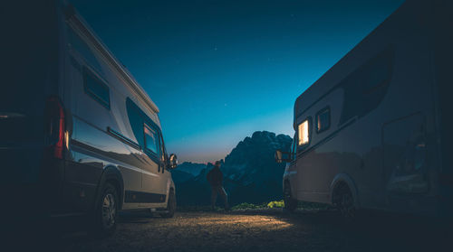 Vehicles on road at night