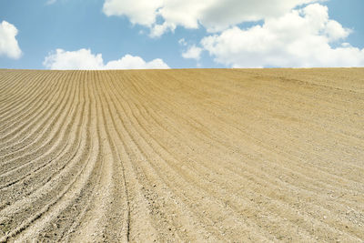 Scenic view of desert against sky