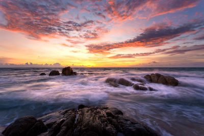 Scenic view of sea against sky during sunset