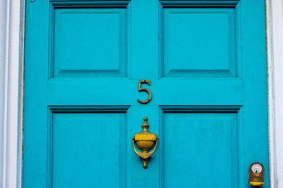 Closed blue door of building