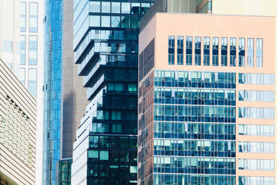 Low angle view of modern buildings in city