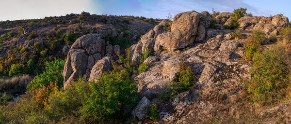 Deep granite canyon with the mertvovod river in aktovo village, nikolaev region, ukraine