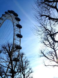 Low angle view of silhouette tree against sky