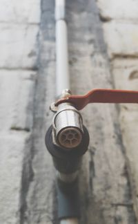 Close-up of metal pipe on wall