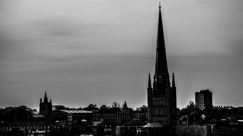 View of cathedral in city against sky