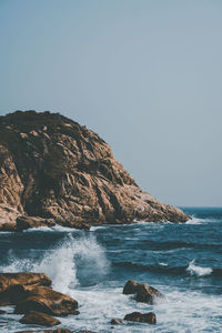 Scenic view of sea against clear sky