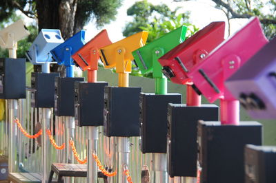 Close-up of multi colored umbrellas hanging on clothesline