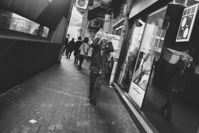 People walking on street at night