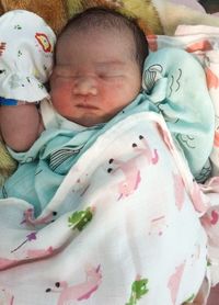 High angle view of baby sleeping