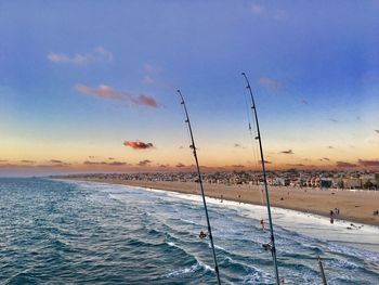 Scenic view of sea against sky at sunset