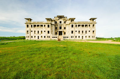 View of old building in field