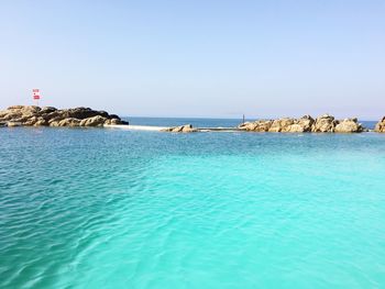 Scenic view of sea against clear sky