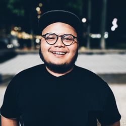 Close-up portrait of smiling young man